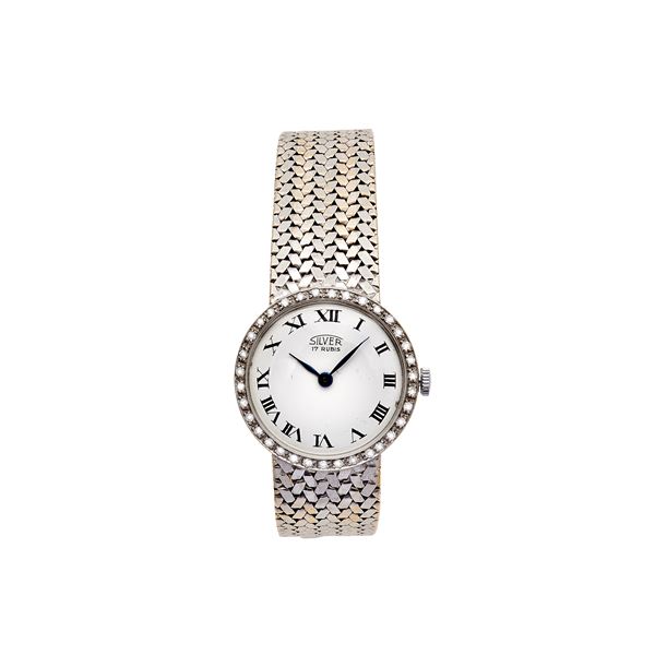 Woman's watch in white gold, yellow gold and diamonds