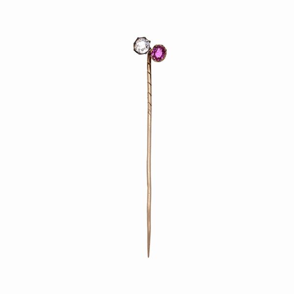 Tie clip with ruby and diamond