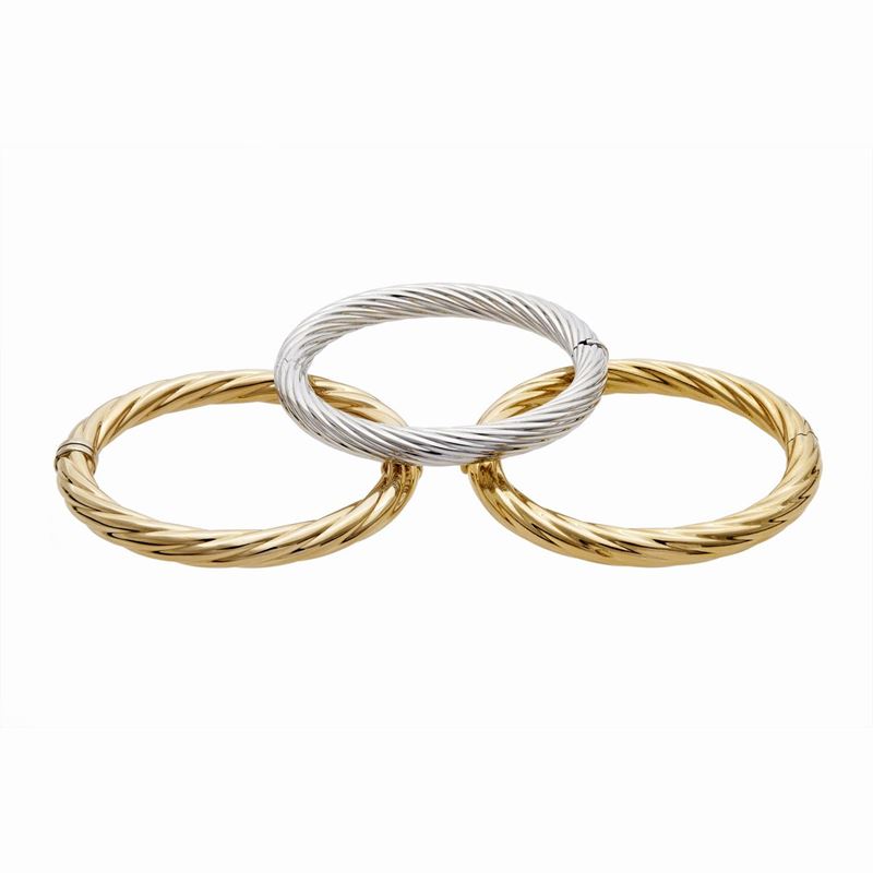Tre Bracciali Rigidi in Oro
