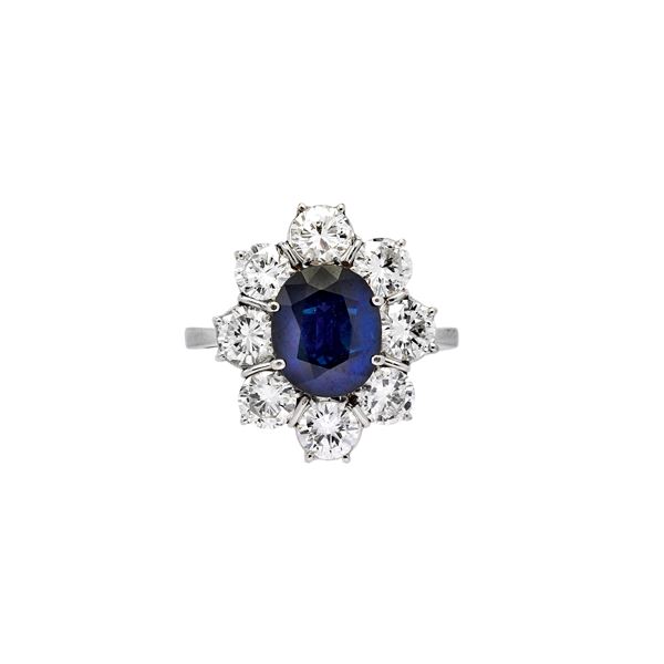 Ring with diamonds and sapphire