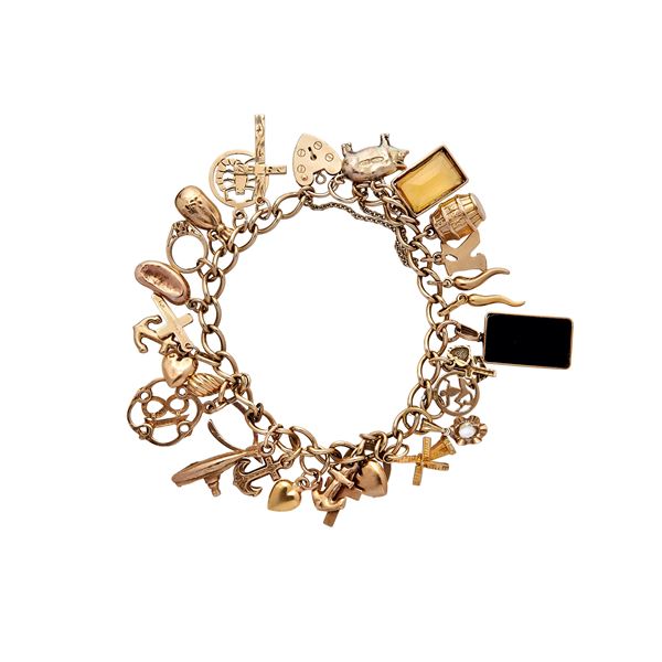 Gold bracelet with charms