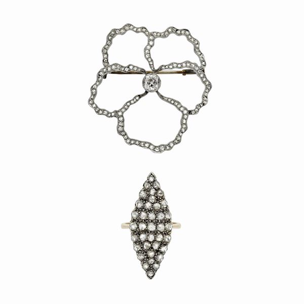 Spilla a fiore in oro bianco e diamanti e anello a losanga