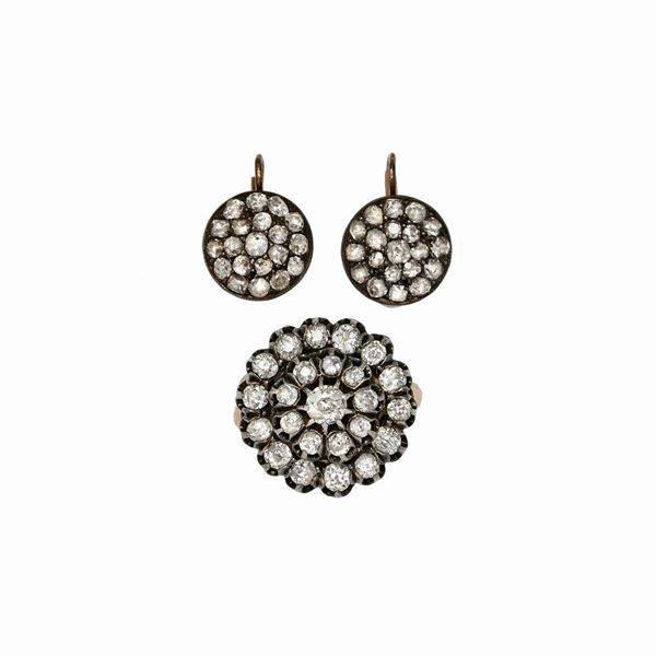Pair of earrings and ring in yellow gold and diamonds