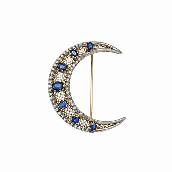 Spilla in oro bianco, giallo, diamanti e zaffiri  - Asta Gioielli Antichi, Moderni, di Design e Orologi - Curio - Casa d'aste in Firenze