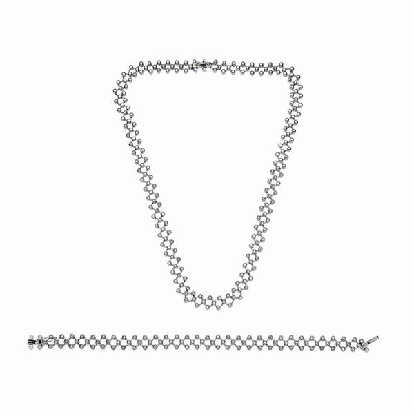 Collana e bracciale in oro bianco e diamanti  - Asta Gioielli Antichi, Moderni, di Design e Orologi - Curio - Casa d'aste in Firenze