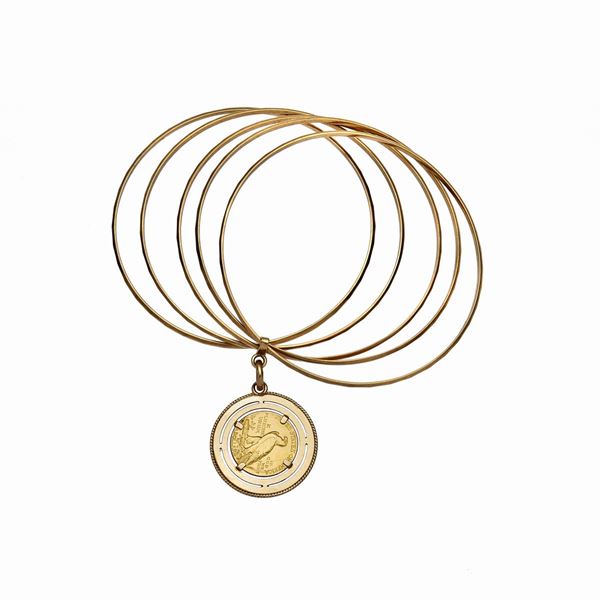 Bracciale rigido in oro con moneta  - Asta Gioielli Antichi, Moderni, di Design e Orologi - Curio - Casa d'aste in Firenze