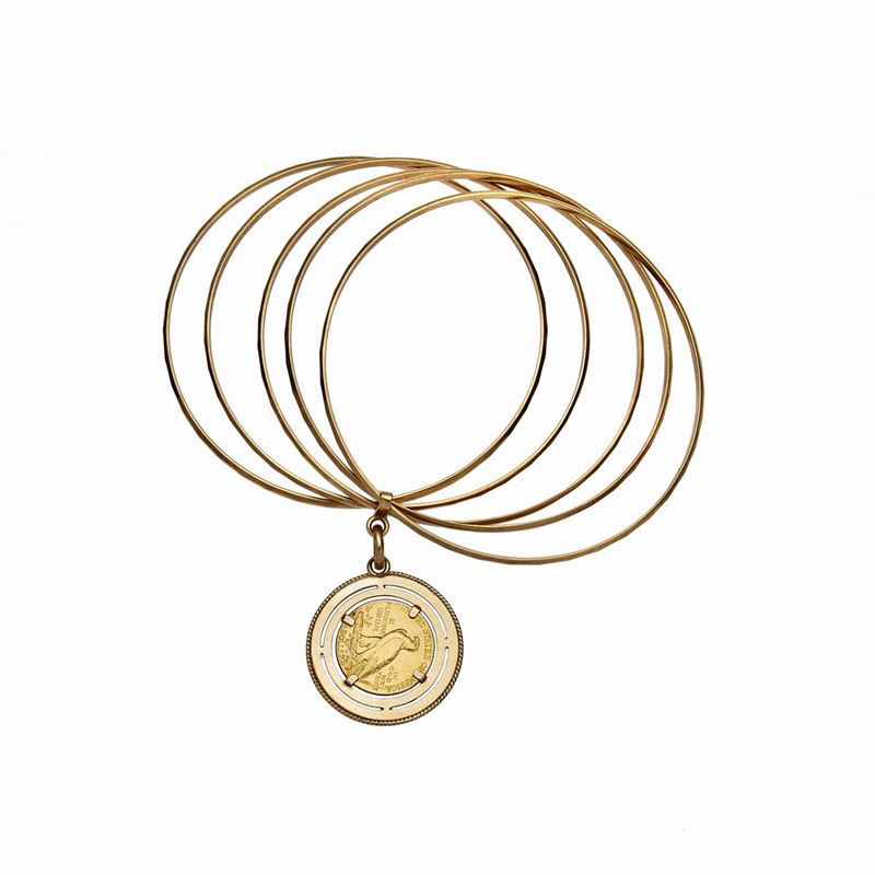 Bracciale Rigido in Oro con Moneta