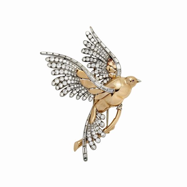 Brooch in yellow gold, white gold and diamonds