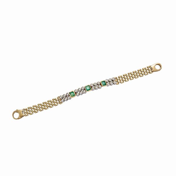 Bracelet in yellow gold, white gold, emeralds and diamonds