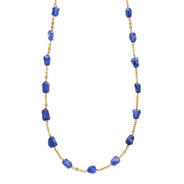 Long necklace in yellow gold and lapis lazuli