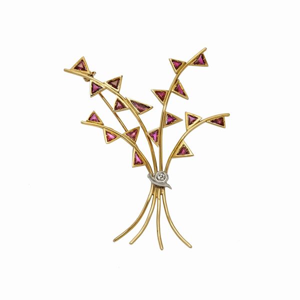 Brooch in yellow gold, white gold, rubies and diamonds