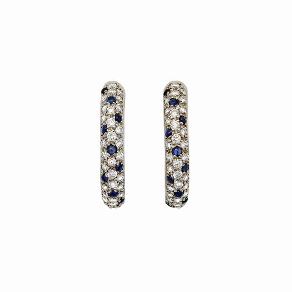 Pair of earrings in white gold, sapphires and diamonds