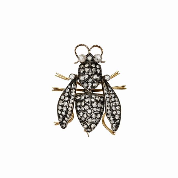 Spilla in oro giallo, argento e diamanti  - Asta Gioielli Antichi, Moderni, di Design e Orologi - Curio - Casa d'aste in Firenze
