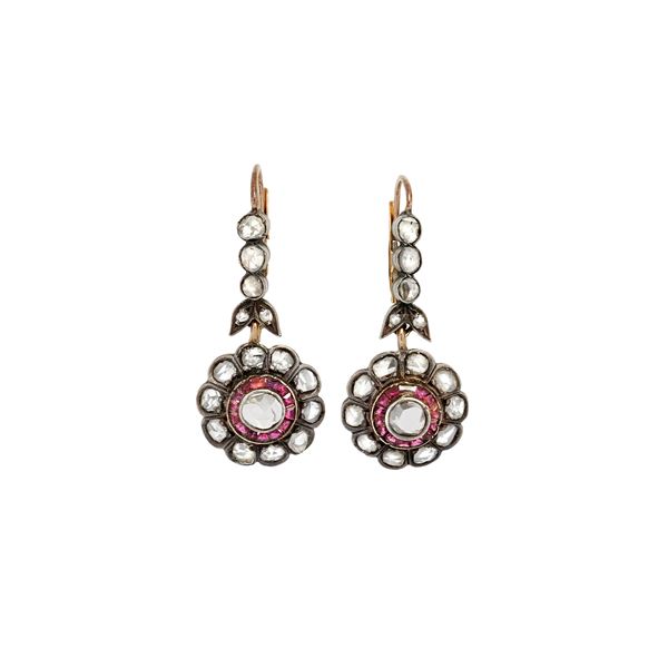 pair of gold earrings low titer, silver, diamonds and rubies