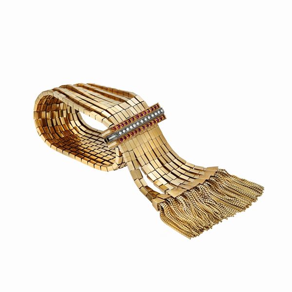 Importante bracciale in oro giallo diamanti e rubini