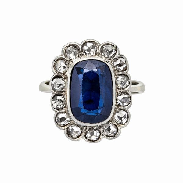 Ring in white gold, diamonds and sapphire