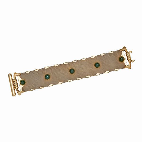 Bracelet in yellow gold and green stones