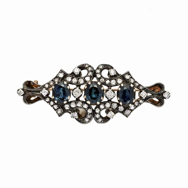 Gold brooch, silver, diamonds and sapphires