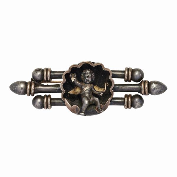 Silver brooch and gold low titer