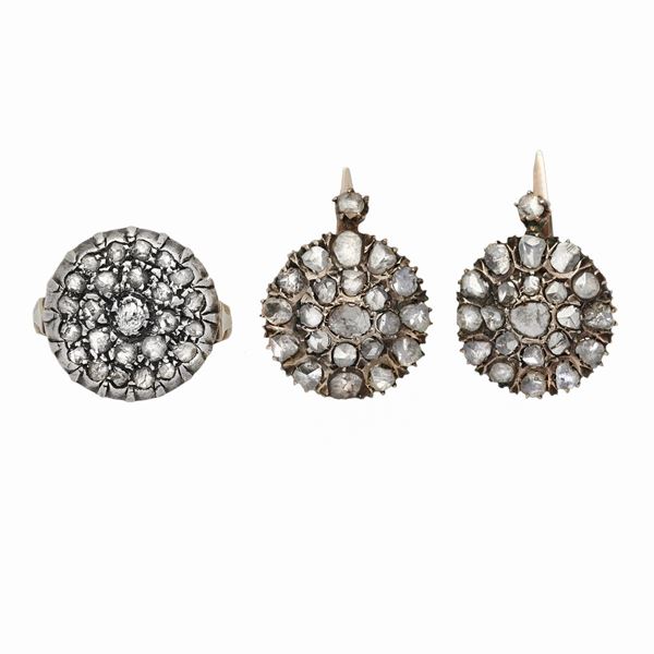 Pair of low titanium earrings and gold ring and diamonds