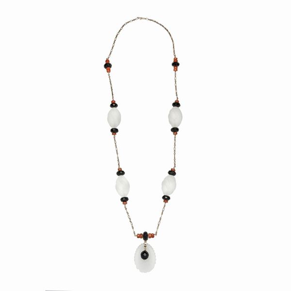 Low titanium gold necklace, onyx, coral and rock crystal