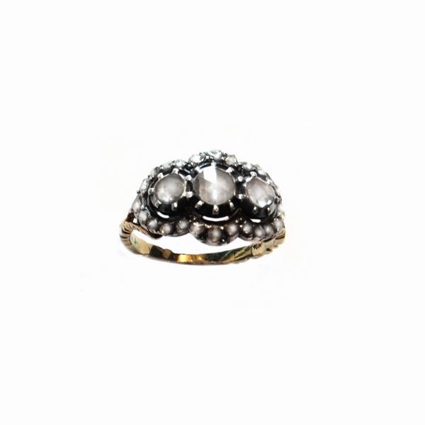 Low-grade gold ring and diamonds