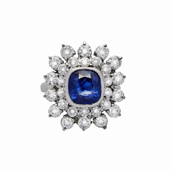 Ring in white gold, diamonds and sapphire