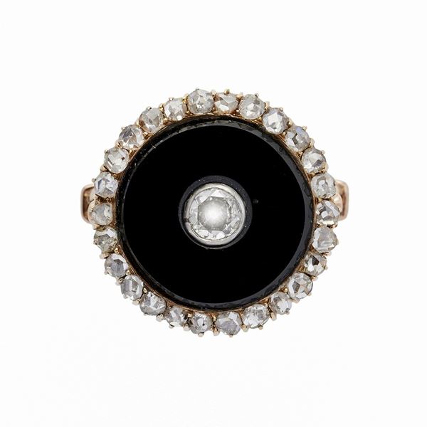 Anello in oro rosa, diamanti e onice