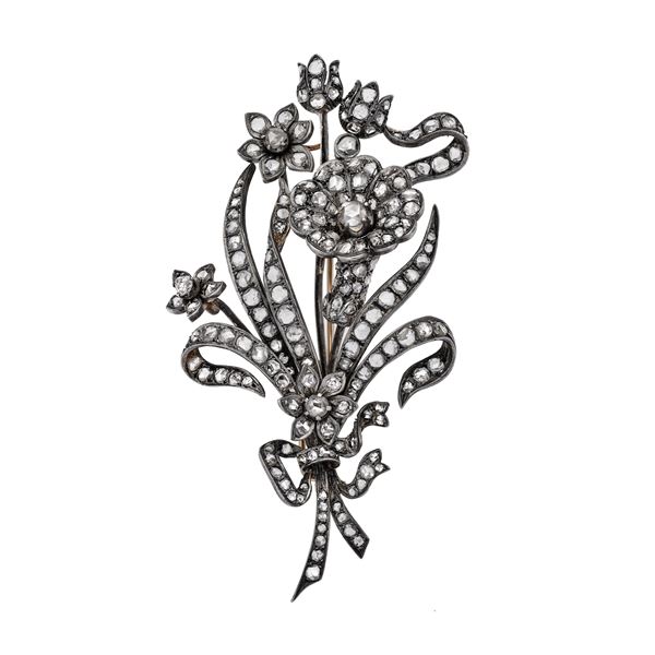Low grade yellow gold, silver and diamond brooch