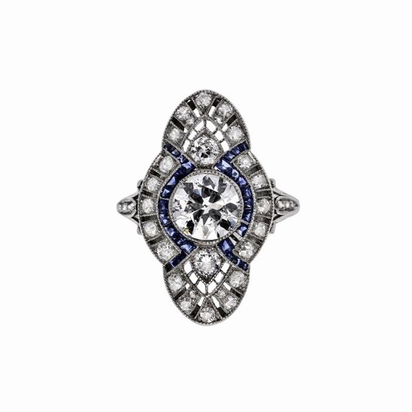 Platinum, diamond and sapphire ring