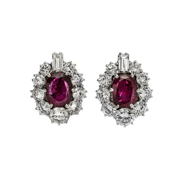 Pair of diamond earrings in white gold, diamonds and rubies