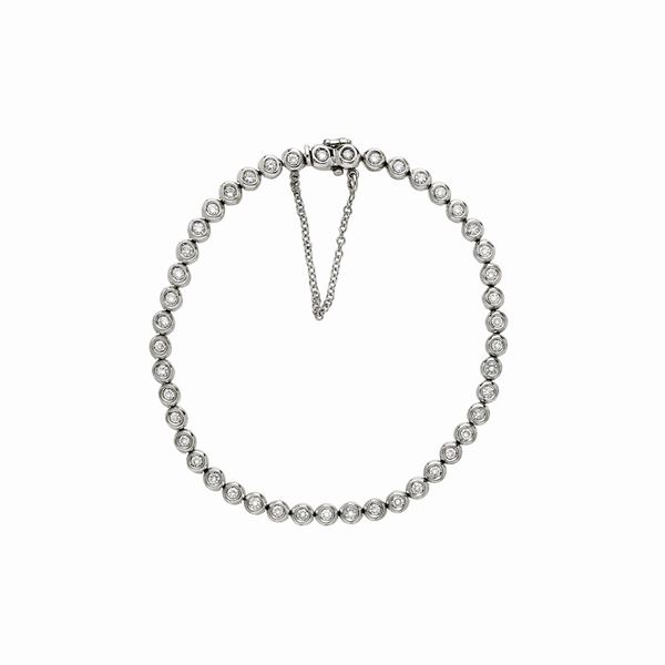 White gold and diamonds tennis bracelet  - Auction Antique Jewelry, Modern and Watches - Curio - Casa d'aste in Firenze
