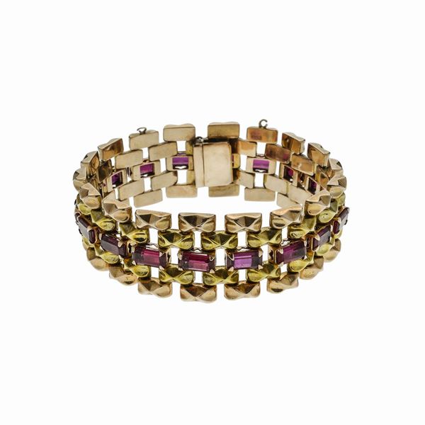 Bracciale in oro giallo, oro rosa e pietre rosse