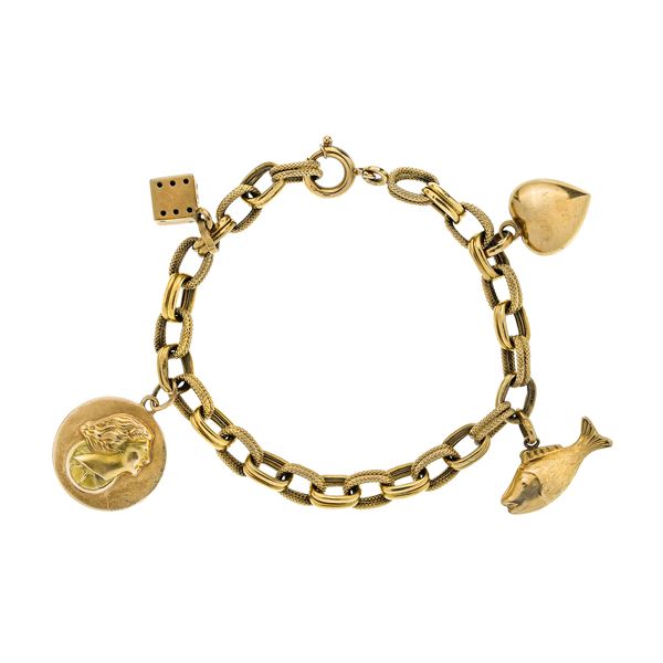 Bracelet in yellow gold with charms UnoaErre