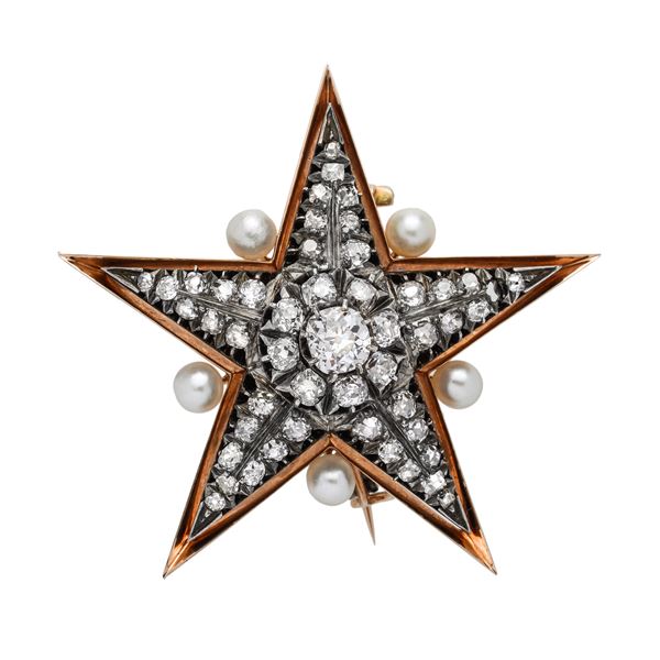 Star brooch in yellow gold, silver, pearls and diamonds
