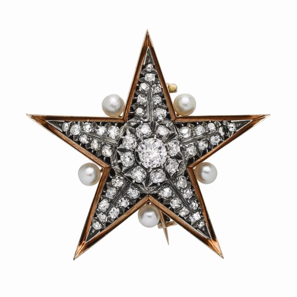 Star brooch in yellow gold, silver, pearls and diamonds