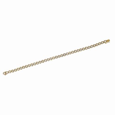 Bracciale Tennis in Oro Giallo e Diamanti