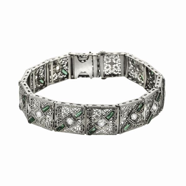 Platinum bracelet, low gold, green stones and diamonds
