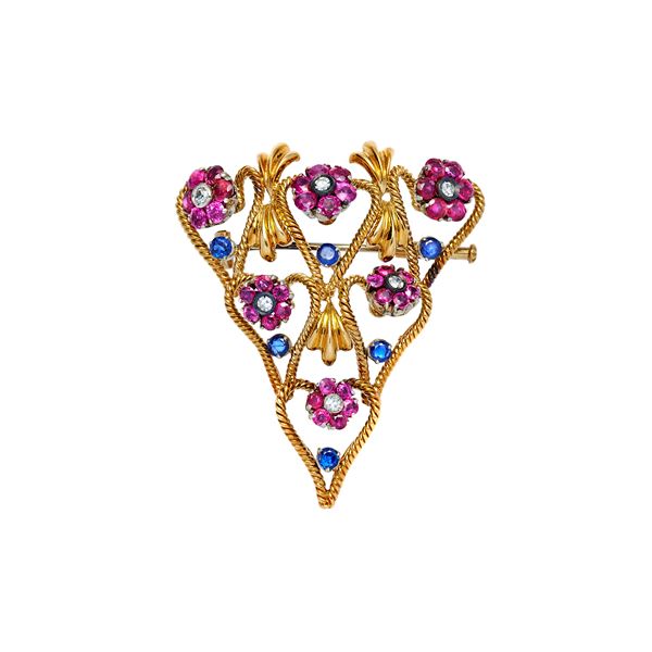 Brooch in yellow gold, diamonds, rubies and sapphires