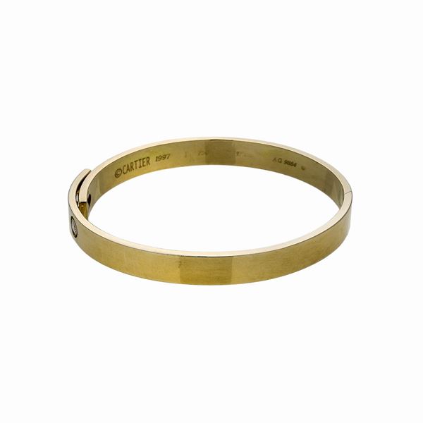 CARTIER - Bangle in yellow gold and diamond Cartier