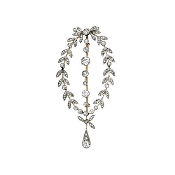 Brooch in yellow gold, platinum and diamonds