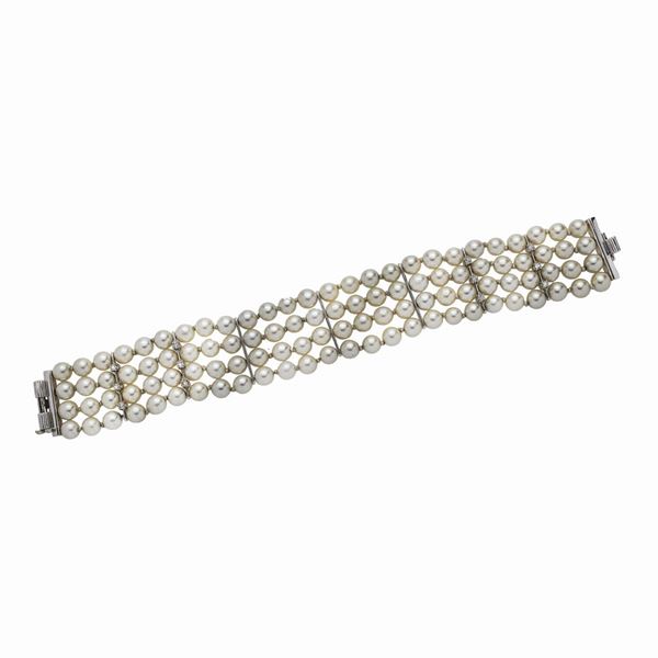 Bracciale in perle, oro bianco e diamanti