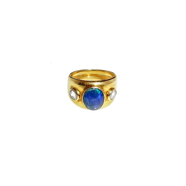 Band ring in yellow gold, opal and diamonds