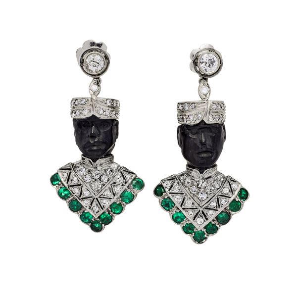Pair of Moro gold earrings, ebony, diamonds and emeralds