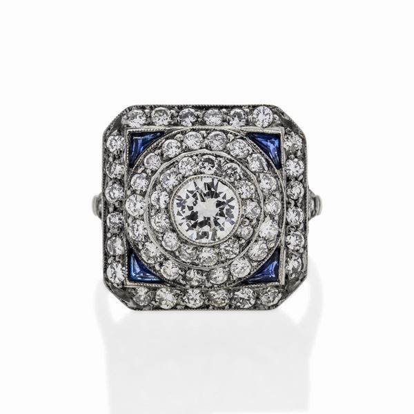 Anello in oro bianco, zaffiri e diamanti