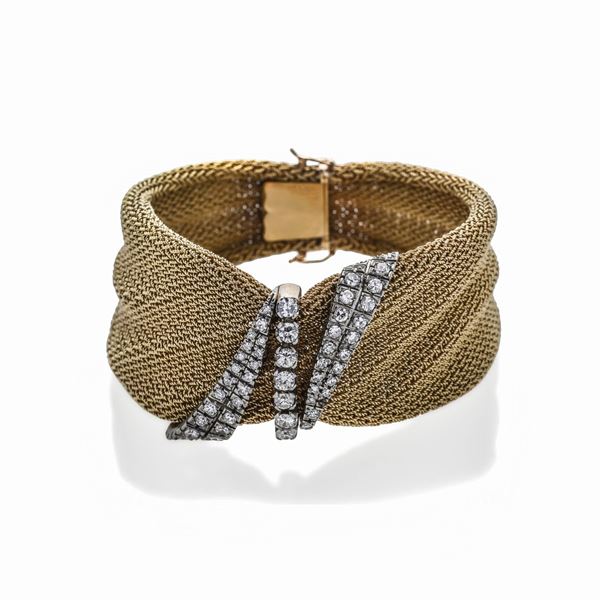 Bracciale in oro giallo, oro bianco e diamanti