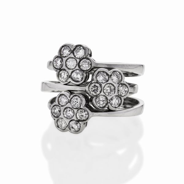 Three Flower rings in white gold and diamonds