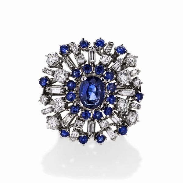 Big ring in white gold, diamonds and  sapphires