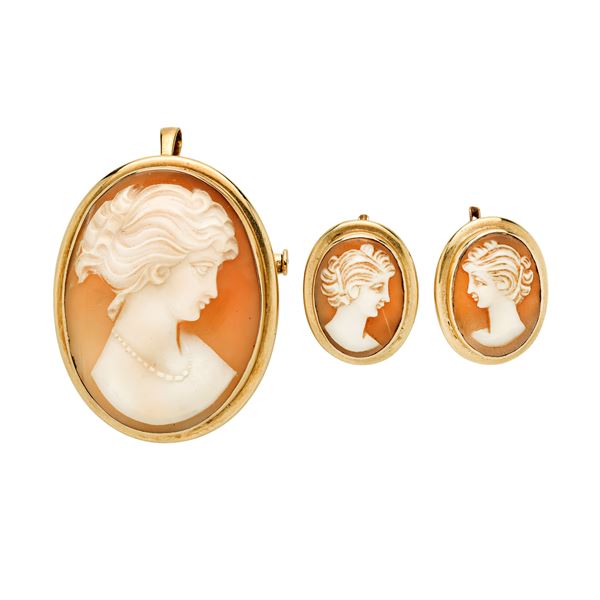 Pair of earrings and brooch in yellow gold and cameos
