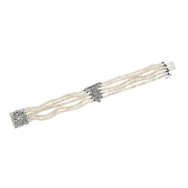 Bracelet in white gold, micro-pearls and diamonds
